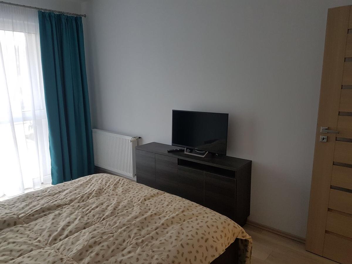 Hotel Platinia Клуж-Напока Екстериор снимка A bedroom with a television